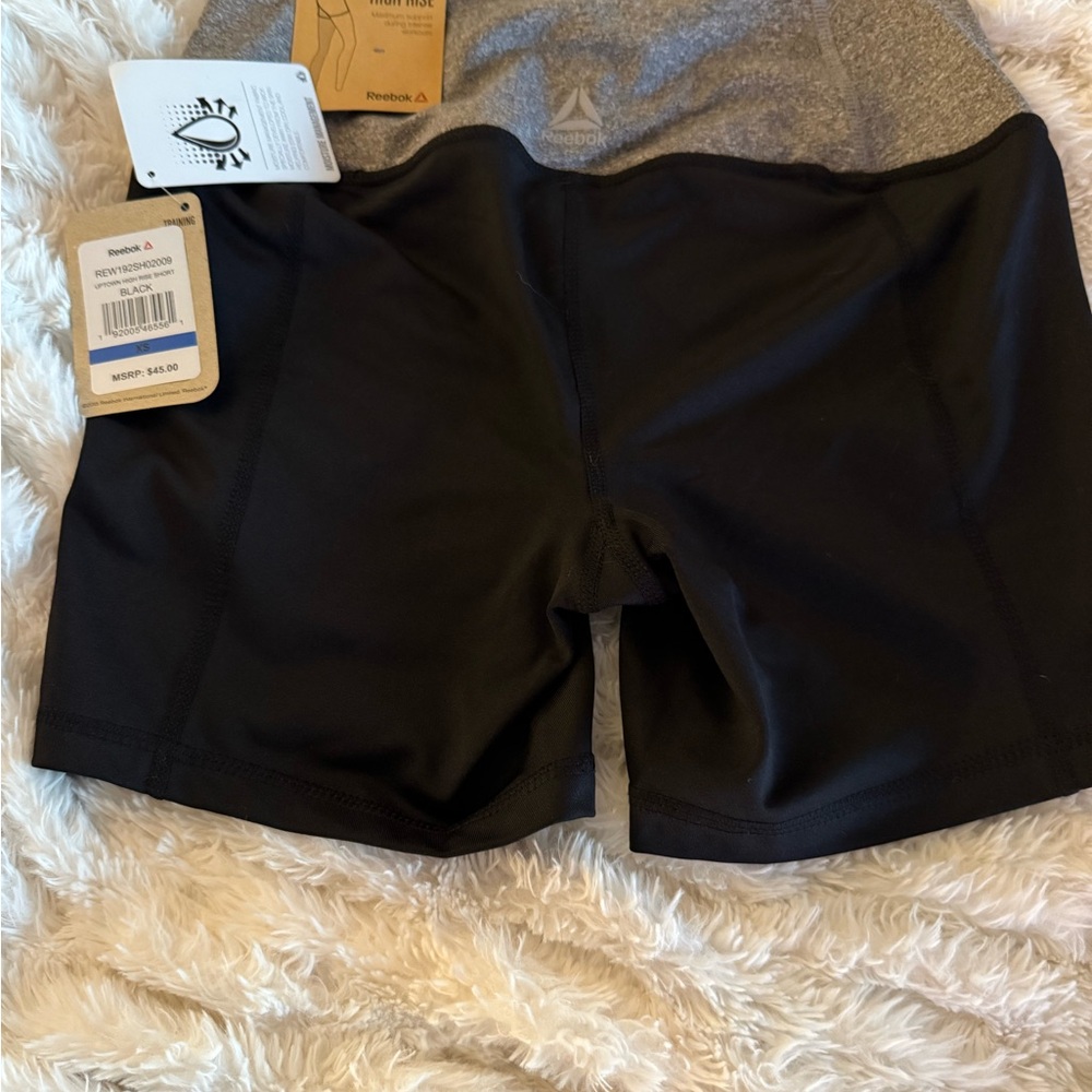 Reebok Women's Capris - Set of 4 1-Mint, 1-Silver, 1-Black and 1 black short. - Picture 13 of 14